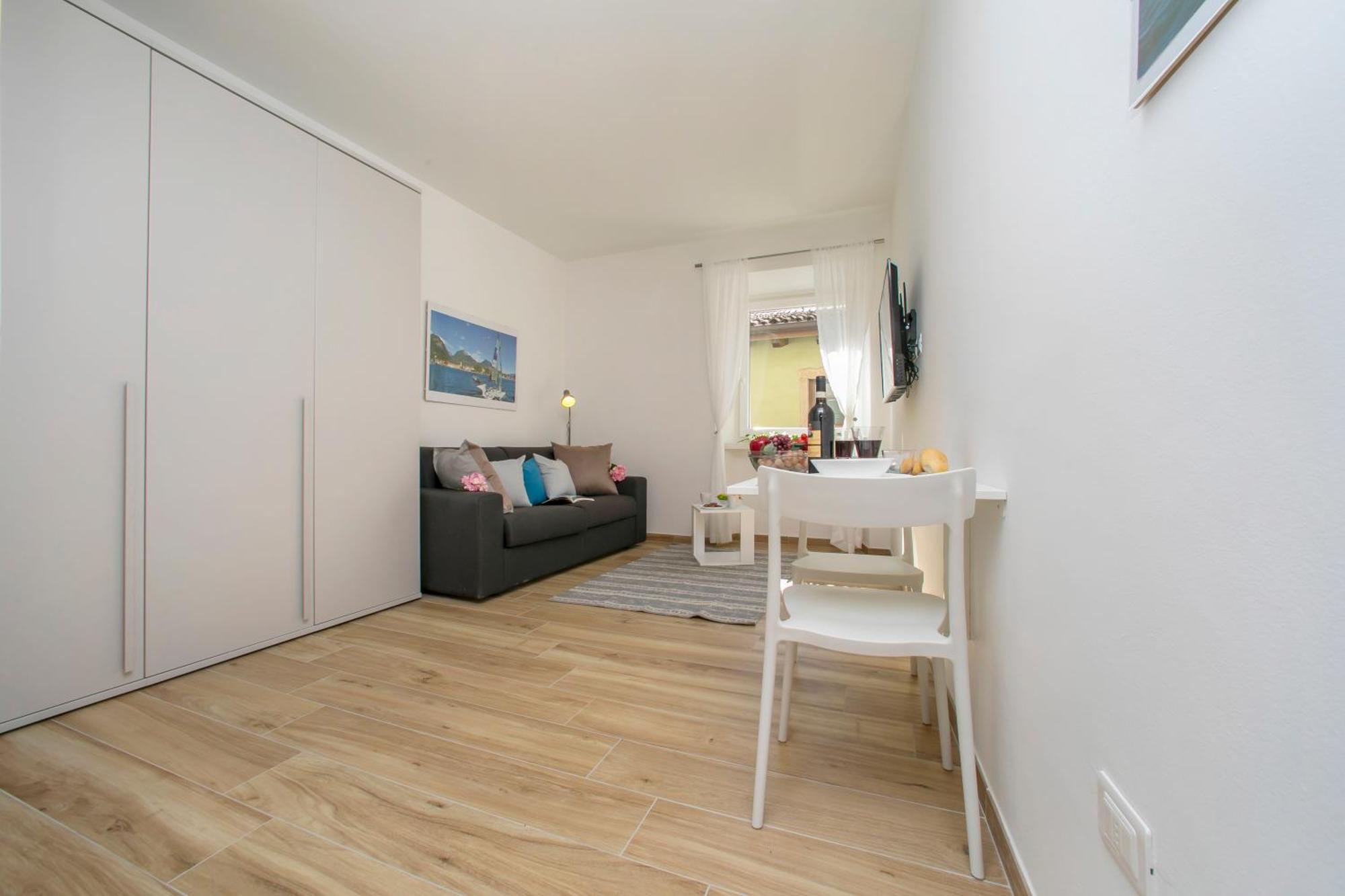 Nido Sui Tetti Di Riva Del Garda - Happy Rentals Luaran gambar